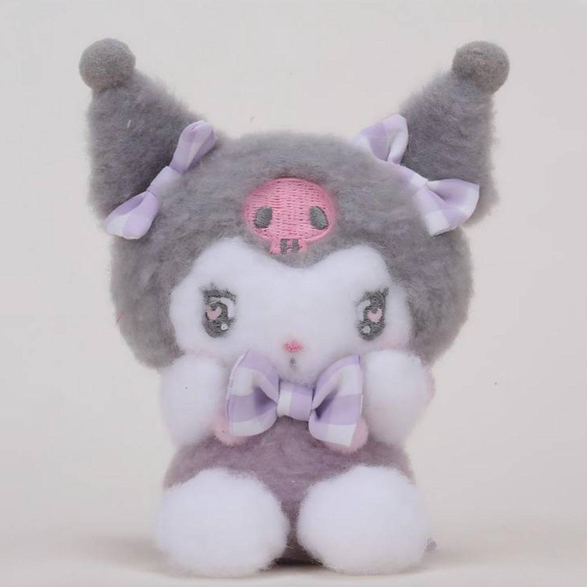Sanrio Cute Justice Series Kuromi plush keychain 10cm, designed with fluffy gray fur, a skull emblem, and a purple gingham bow.