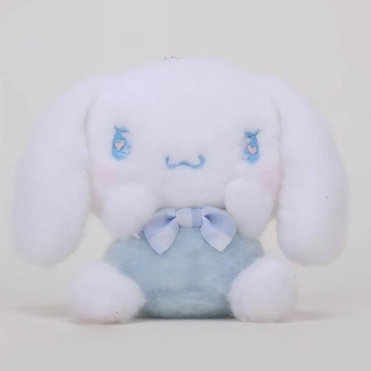 Sanrio Cute Justice Series Cinnamoroll plush keychain 10cm, featuring white fur, blue outfit, and embroidered facial details.