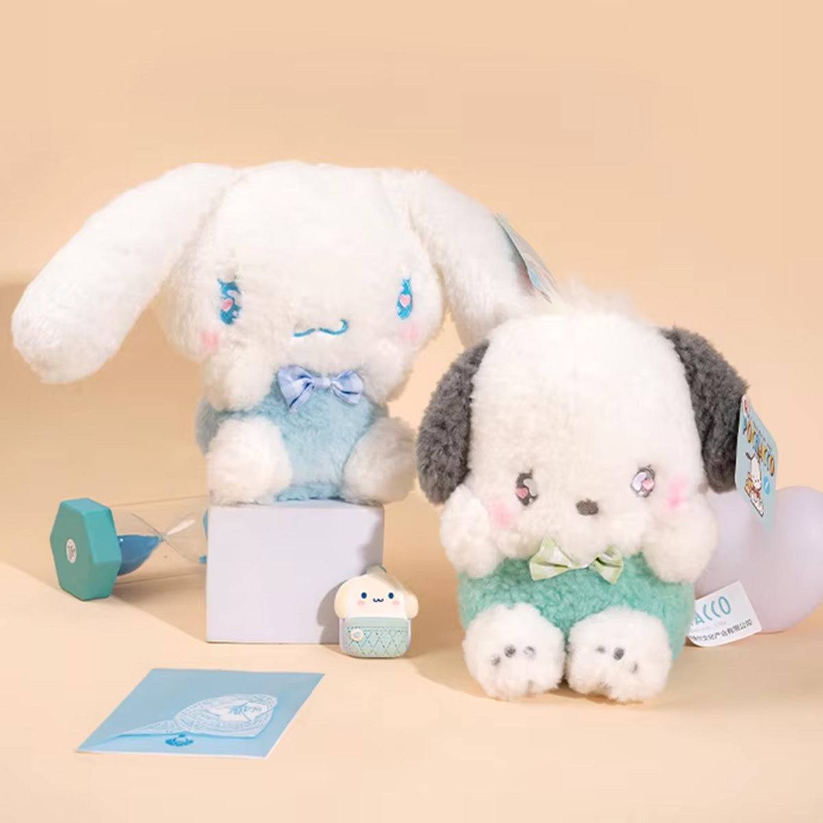 Sanrio Cute Justice Series Cinnamoroll and Pochacco plush keychains 10cm, featuring soft blue and white fur with adorable bow accents.