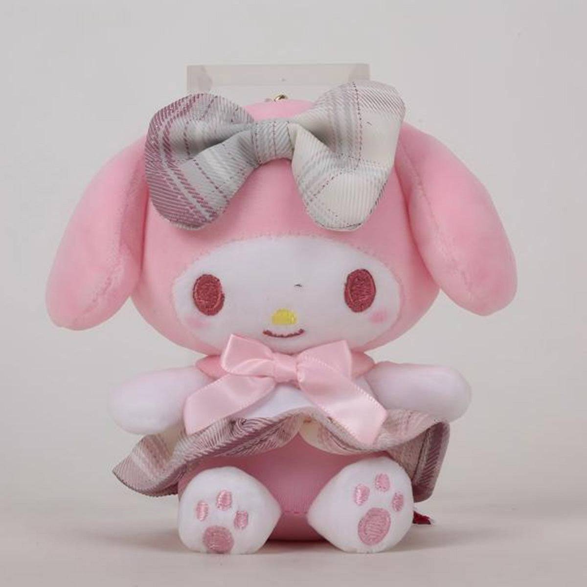 Front view of Sanrio JK Series My Melody Plush Keychain 10cm, showcasing its soft plush material, embroidered details, and stylish plaid accessories.