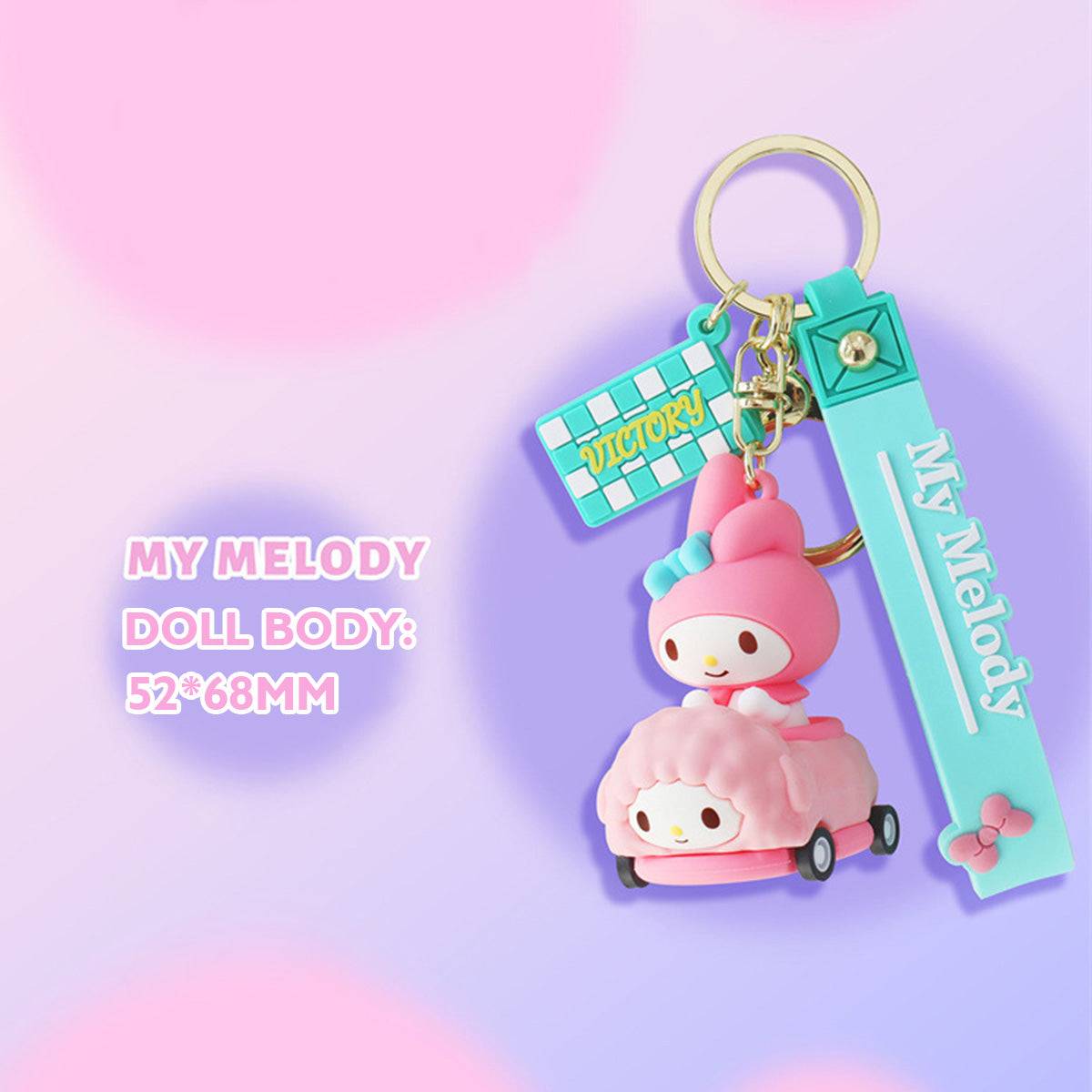 My Melody Sanrio keychain in a pink fluffy race car with rolling wheels, with dimensions of 52*68mm displayed.