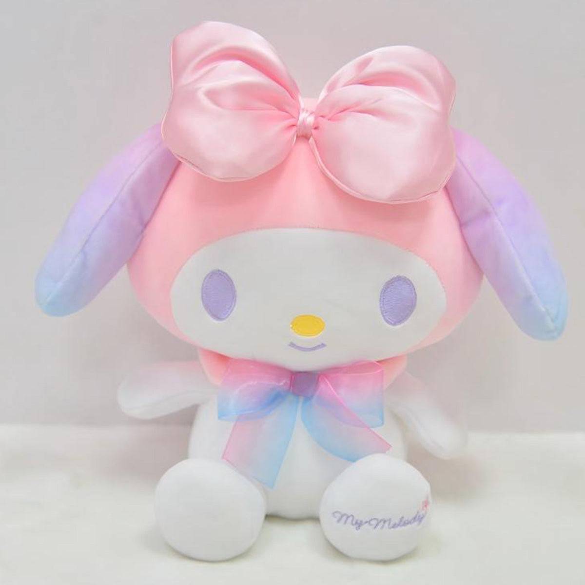 Sanrio My Melody plush toy in a 28cm size with a pastel pink bow and gradient ears, designed for cuddling and display in any plush collection.