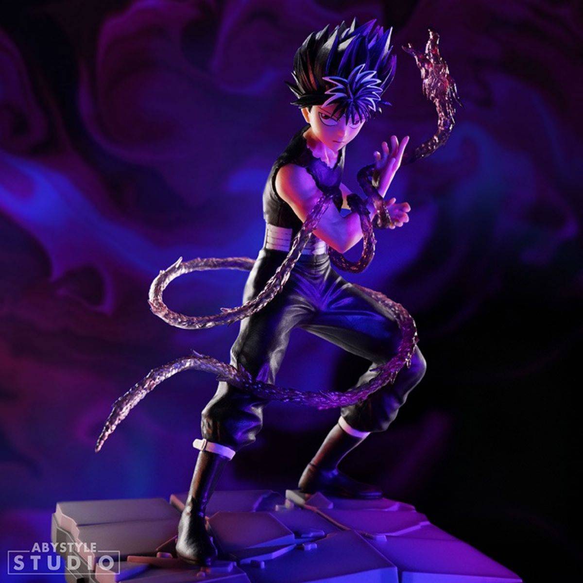 Yu Yu Hakusho Hiei SFC Figure by ABYstyle Studio posed on a stone base with a swirling Dragon of the Darkness Flame effect in a dramatic setting.