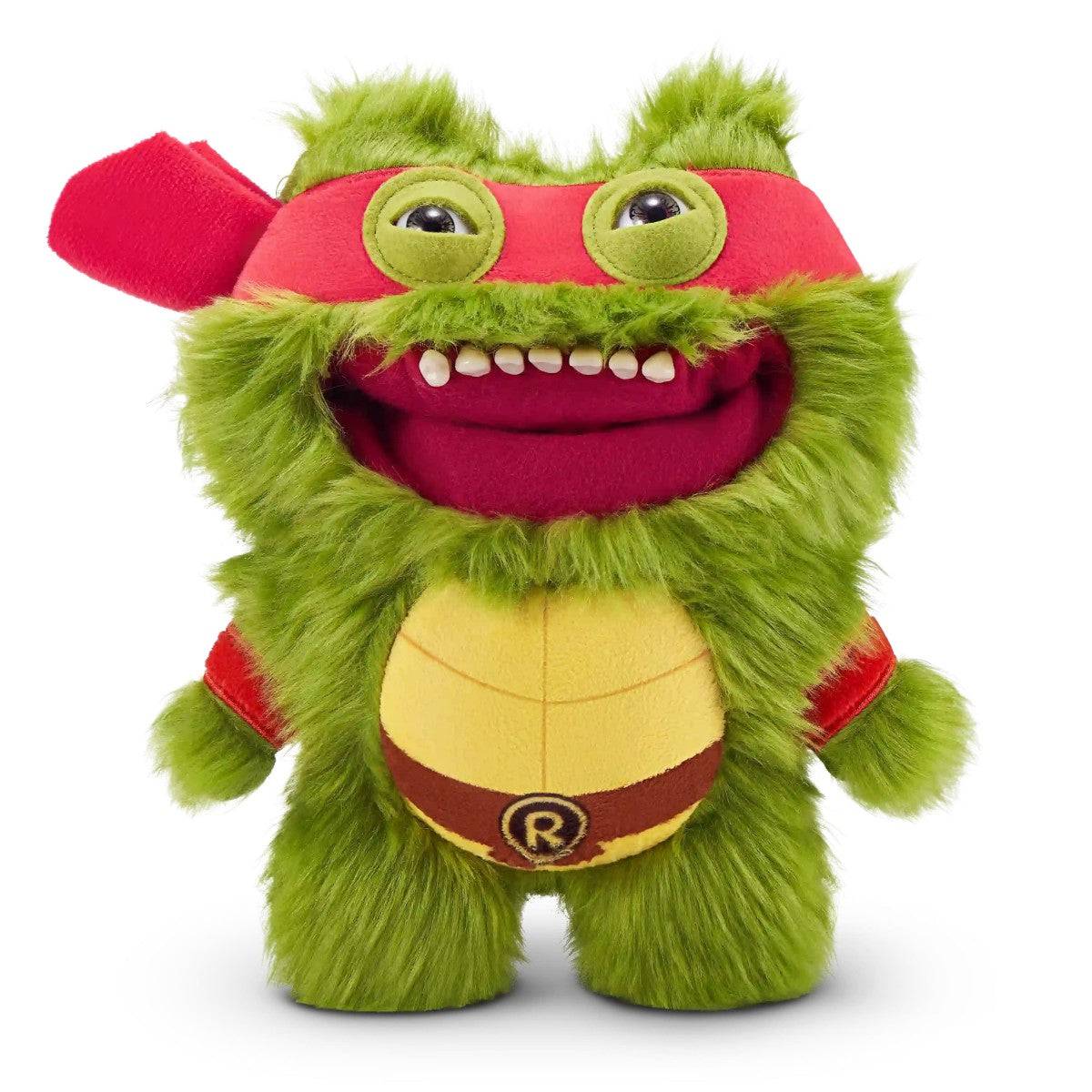 FUGGLER Soft Plush Toy in green fur with red mask and open mouth. A quirky stuffed animal inspired by ninja turtle characters.