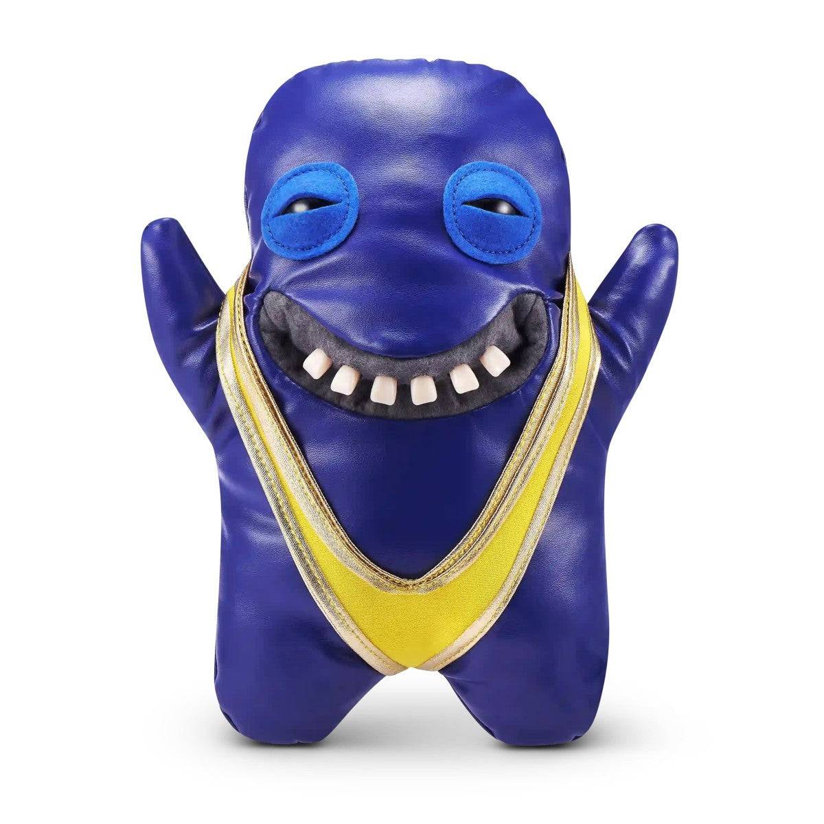 FUGGLER Soft Plush Toy in shiny blue with yellow wrestling outfit and raised arms. A playful plush for fans of humorous characters.
