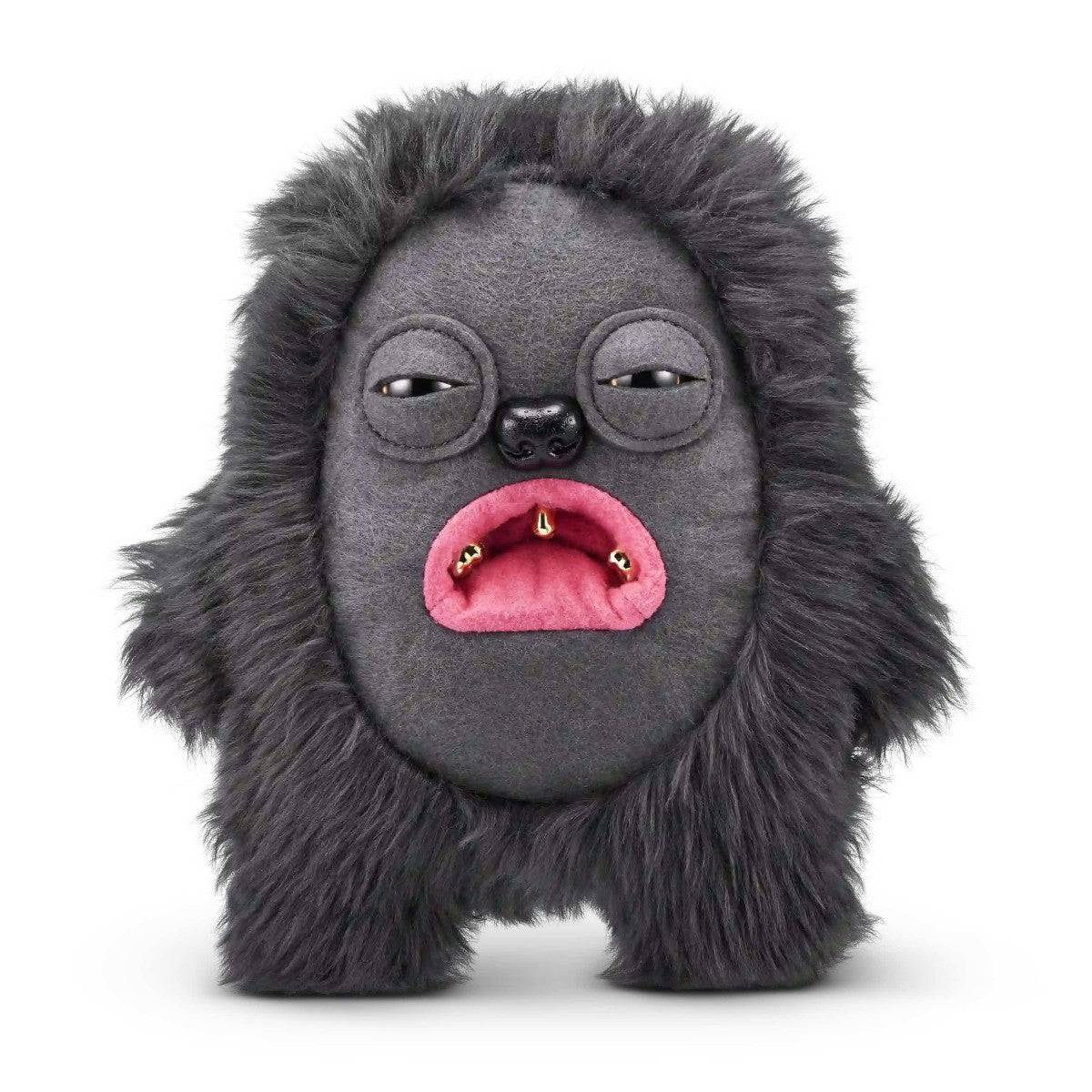 FUGGLER Soft Plush Toy resembling a gorilla with dark fur and pink lips. A weird and wild plush for unique toy collections.