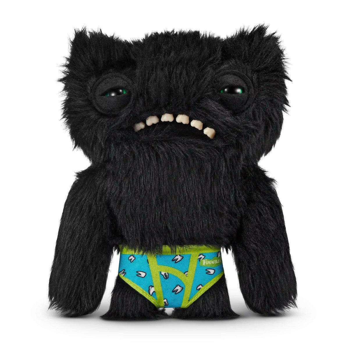 FUGGLER Soft Plush Toy in black fur with green printed shorts and small teeth. A spooky plush for quirky toy collections.