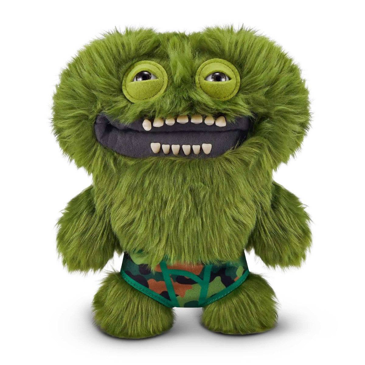 FUGGLER Soft Plush Toy in green fur with camo shorts and big smile. A humorous plush for fans of monster-themed toys.