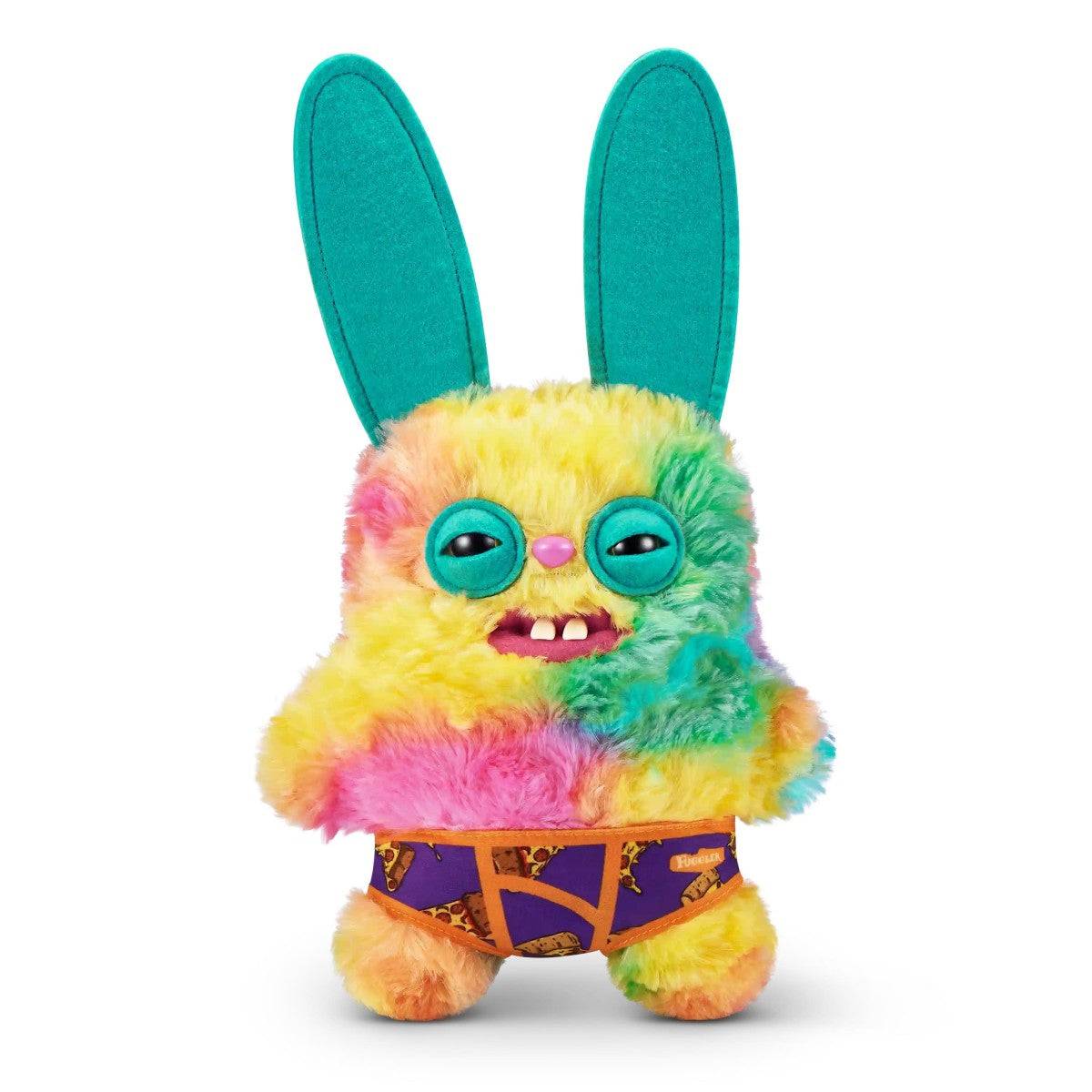 FUGGLER Soft Plush Toy with rainbow fur, teal bunny ears, and purple shorts. A colorful and whimsical plush for kids and collectors.