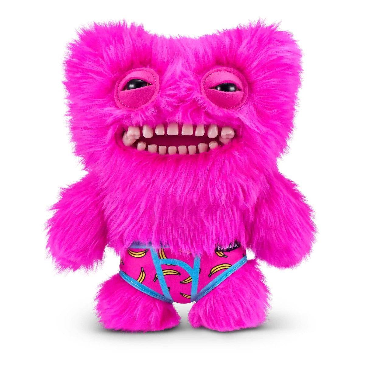 FUGGLER Soft Plush Toy in hot pink fur with banana-print shorts and toothy grin. A fun and fuzzy plush for novelty toy fans.