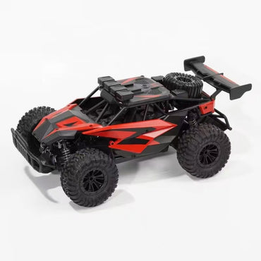 Red and black WBRC 1809 1:14 Off Road RC Monster Truck featuring large tires and aerodynamic body for extreme off-road play | HugmieToys