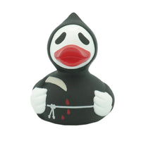 Lilalu Rubber Duck in a grim reaper costume with a black hood and scythe. A spooky bath toy from the Lilalu Rubber Ducks Baby Bath Toys Blind Box.