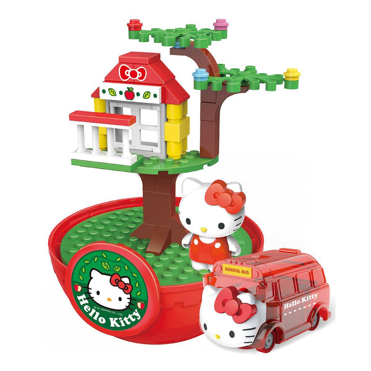 Hello Kitty-themed Four Seasons House capsule toy with a red and white treehouse, Hello Kitty figure, and matching school bus.