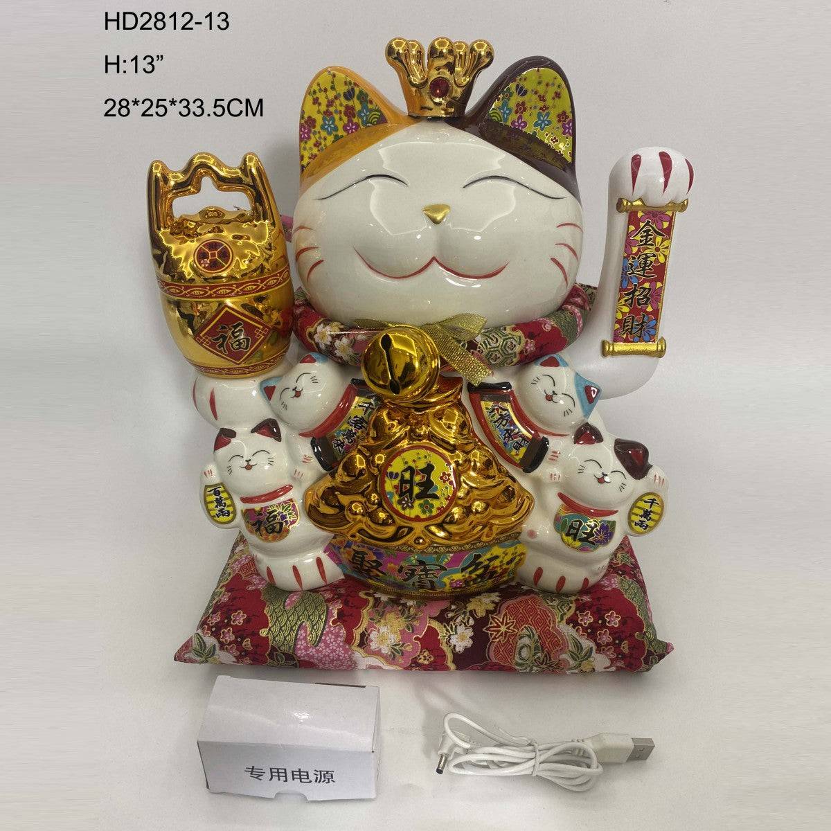13-inch Lucky Cat Figurine with crown and gold accents, seated on red cushion. Comes with USB power adapter for decorative use.