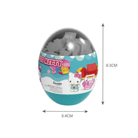 Hello Kitty Music Party Capsule Toy KT-010332 teal blind box showcasing a toy set with a pink sofa design, 8.3 cm height and 6.4 cm width.