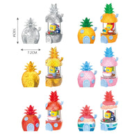 Set of SpongeBob SquarePants Blind Box Happy Pineapple House toys in various colors and designs, featuring detailed pineapple-shaped houses with SpongeBob figurines inside.