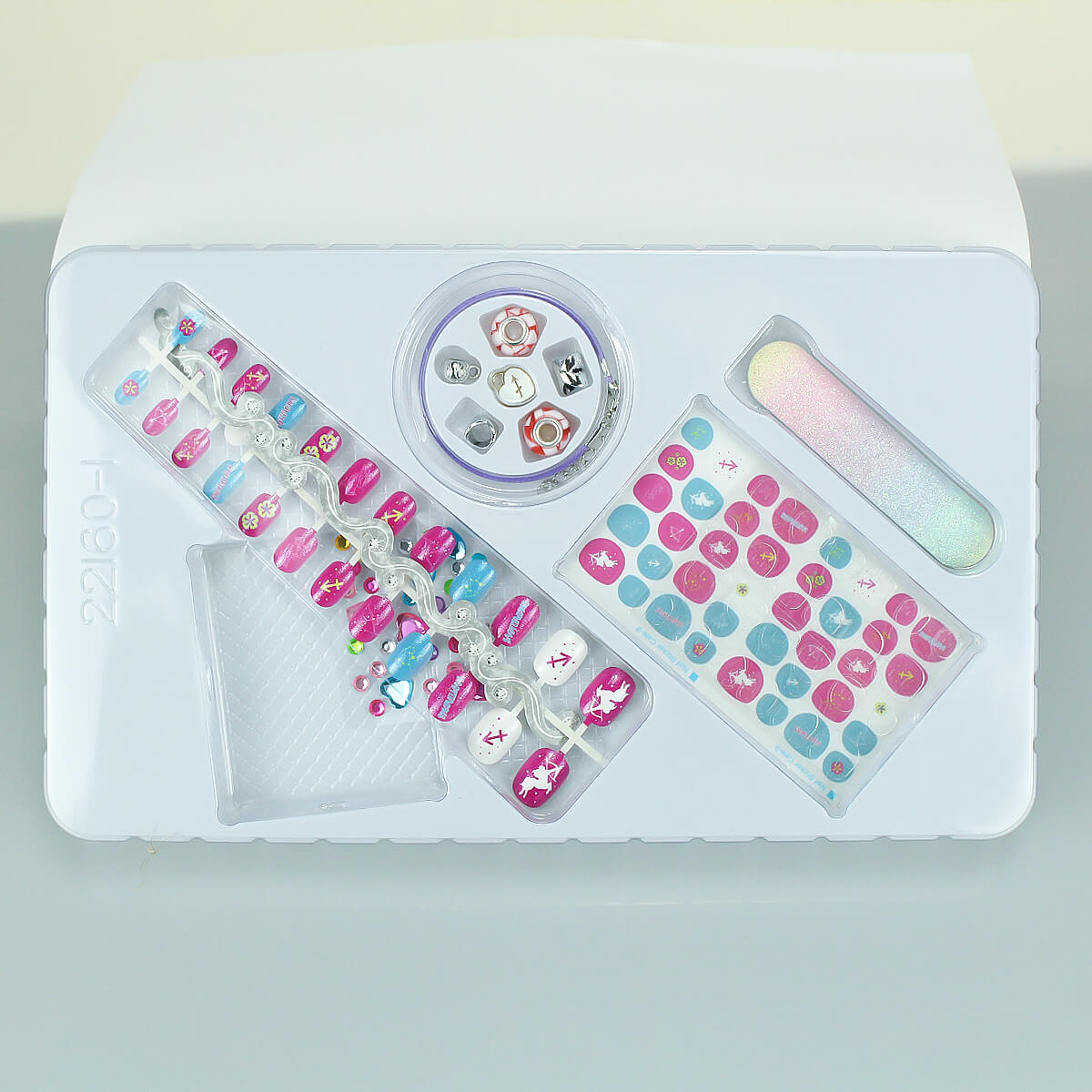 12 Zodiac Signs Kids Nail Art Set HW23158395 by HugmieToys. Includes colorful nail stickers, press-on nails, nail file, and decorative gems for creative kids' DIY nail art fun.