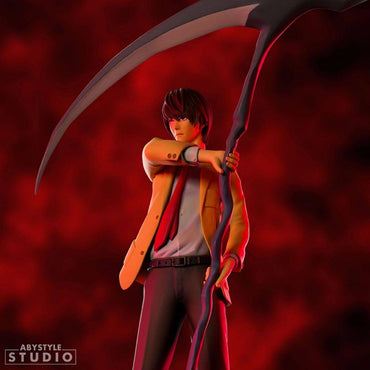 Death Note Light Yagami SFC Figure by ABYstyle Studio, posed with a scythe against a dramatic red background, ideal for anime figure collectors.