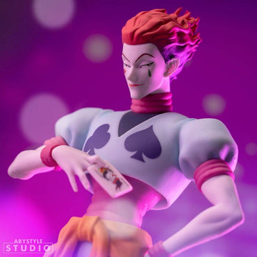 Close-up of ABYstyle Studio Hunter x Hunter Hisoka SFC Figure 20cm, showcasing Hisoka's detailed facial expression and playing card.