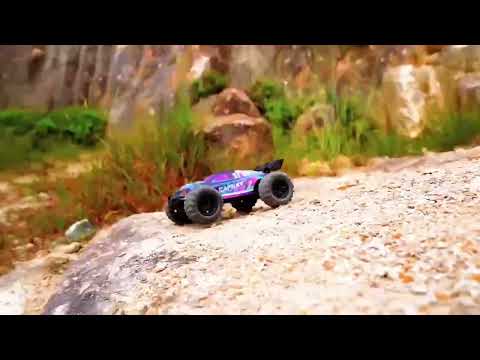 WBRC-I01 remote control car in action on rocky terrain, demonstrating its powerful motor and off-road capabilities.