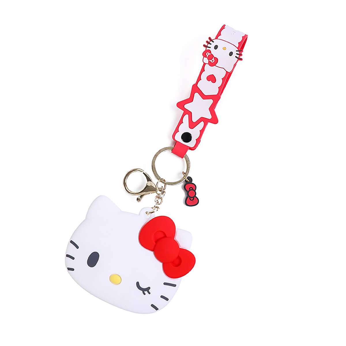 Hello Kitty-themed Sanrio Cartoon Silicone Coin Purse Keychain in white with a red bow. Features a matching strap and keyring for convenience.