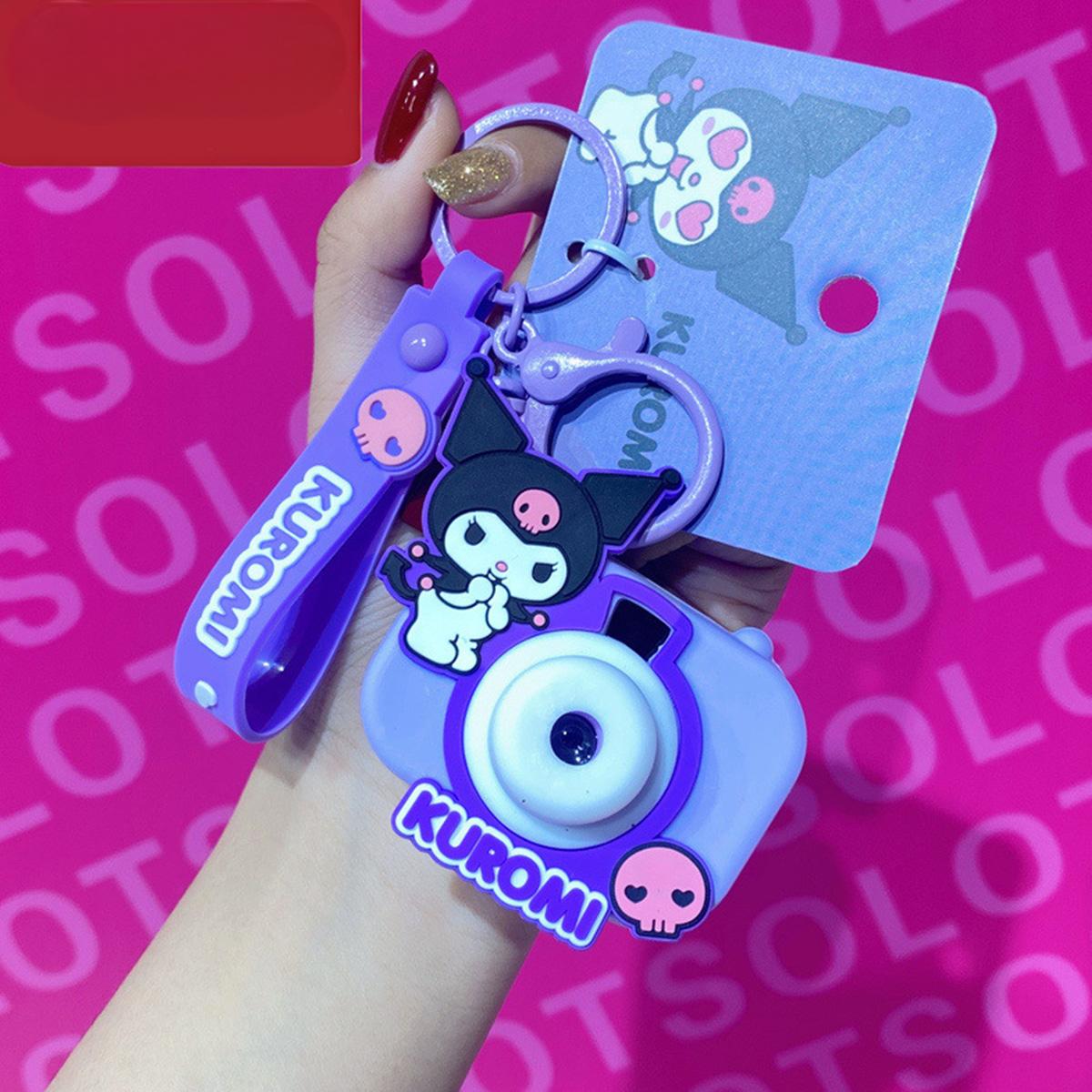 Purple Kuromi Sanrio Characters Cute Camera Pendant Keychain with a fun projector light and skull accents.