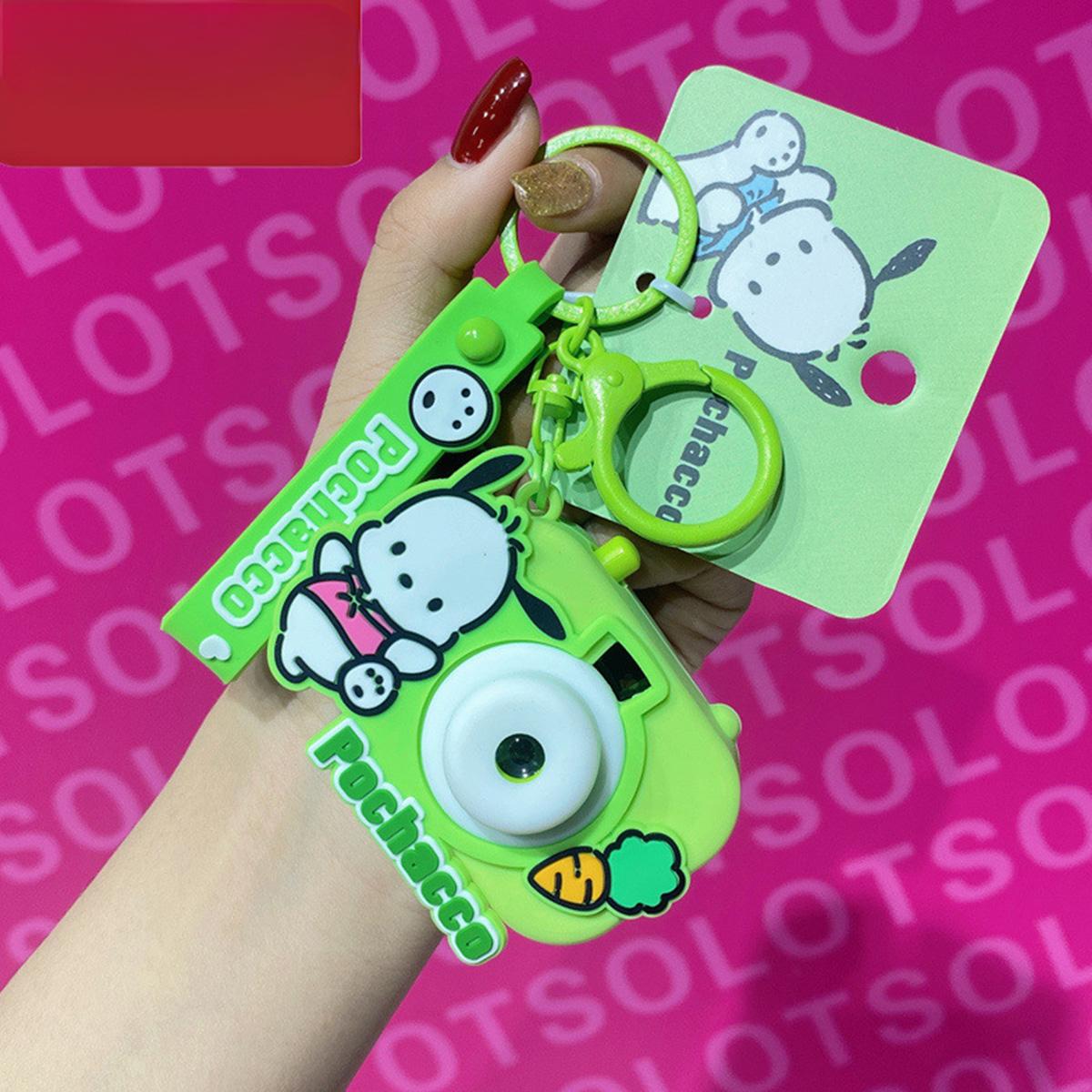 Green Pochacco Sanrio Characters Cute Camera Pendant Keychain with a projector light and matching strap.