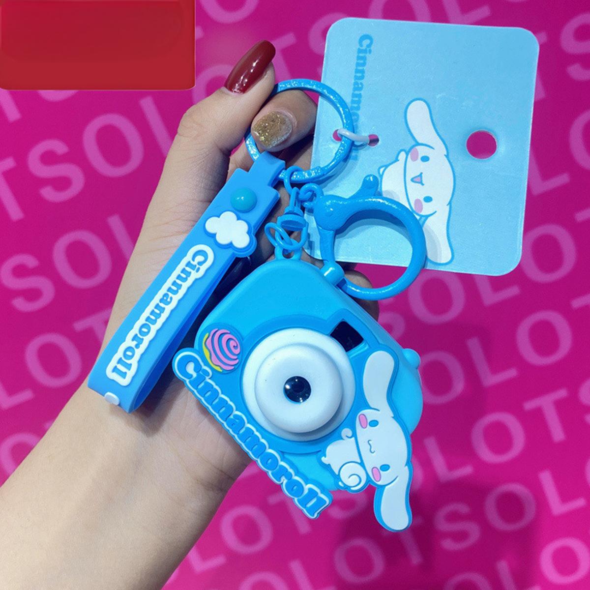 Blue Cinnamoroll Sanrio Characters Cute Camera Pendant Keychain with a projector light and cloud-themed details.