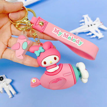 Sanrio Characters in Airplane Keychain featuring My Melody in a pink airplane with a matching wrist strap. A charming accessory for Sanrio lovers.