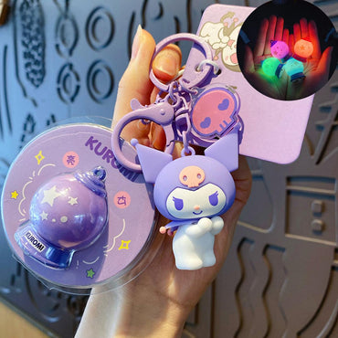 Sanrio Characters Keychain with Night Light featuring Kuromi. A stylish purple keychain with a glowing night light charm for Sanrio lovers.