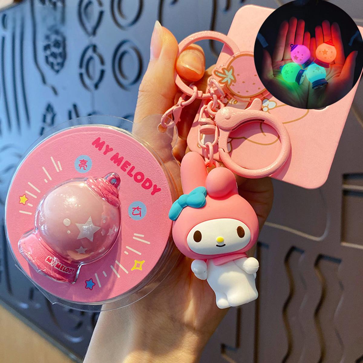 Sanrio Characters Keychain with Night Light featuring My Melody. A pink keychain with an adorable night light charm, ideal for collectors.