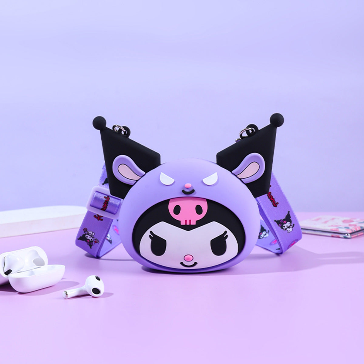 Sanrio Characters Mini Silicone Crossbody Bag with a purple Kuromi design. A fun and trendy accessory for Sanrio lovers.