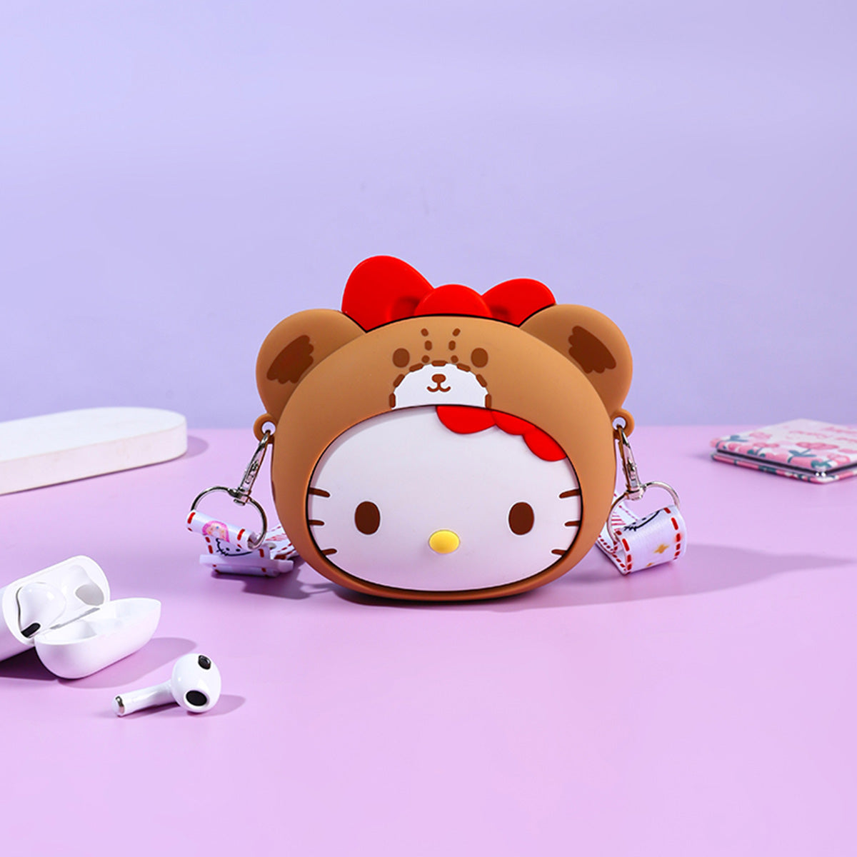 Sanrio Characters Mini Silicone Crossbody Bag in a brown Hello Kitty bear design. Stylish and functional for carrying small essentials.