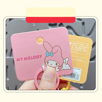 Backside of My Melody Sanrio Characters Polaroid Camera Keychain packaging, displaying official branding and product details for authenticity.