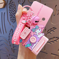 My Melody-themed Sanrio Characters Polaroid Camera Keychain in pink with a charming design, bell charm, and wrist strap. A cute collectible accessory.