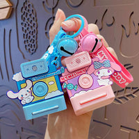 Cinnamoroll and My Melody Sanrio Characters Polaroid Camera Keychains displayed together, showcasing their adorable designs and collectible appeal.