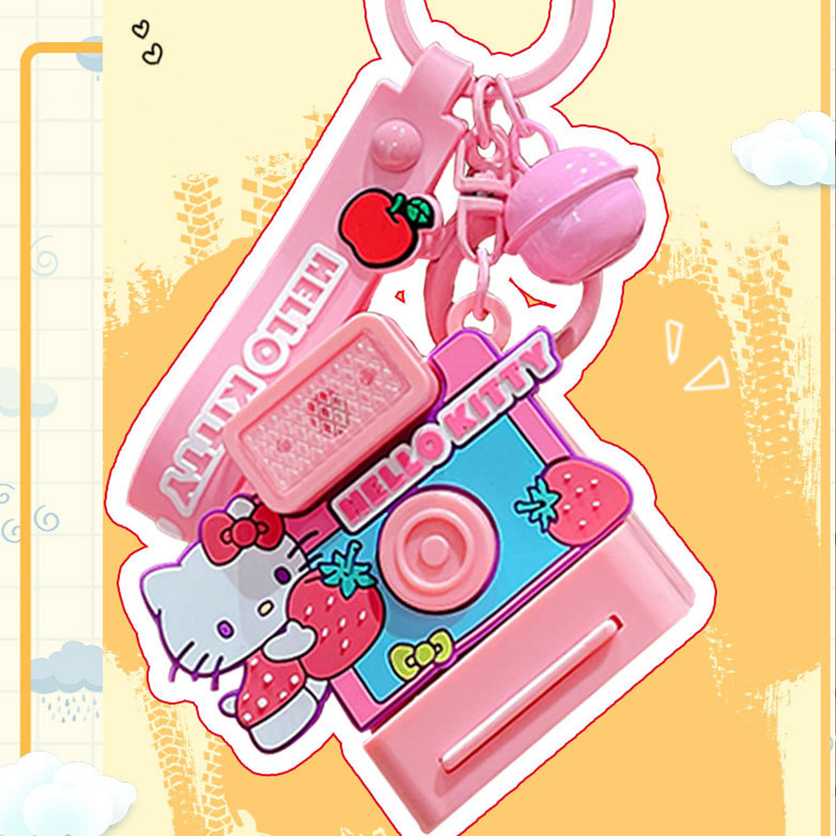 Hello Kitty Sanrio Characters Polaroid Camera Keychain with a vibrant pink and blue design, featuring a strawberry theme and functional camera details.