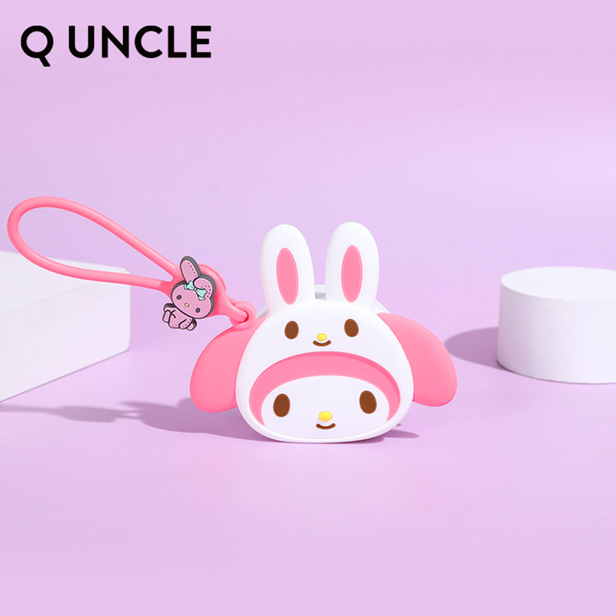 Sanrio My Melody-inspired silicone coin purse in pink and white with bunny ears. A cute and practical accessory for children and collectors.