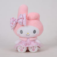 Sanrio Flower Fairy Series My Melody plush toy in a pink floral dress with a matching bow. Adorable and soft collectible for Sanrio lovers.