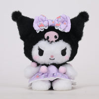 Sanrio Flower Fairy Series Kuromi plush toy in a purple floral dress with a matching bow. Soft and cuddly collectible for Sanrio fans.