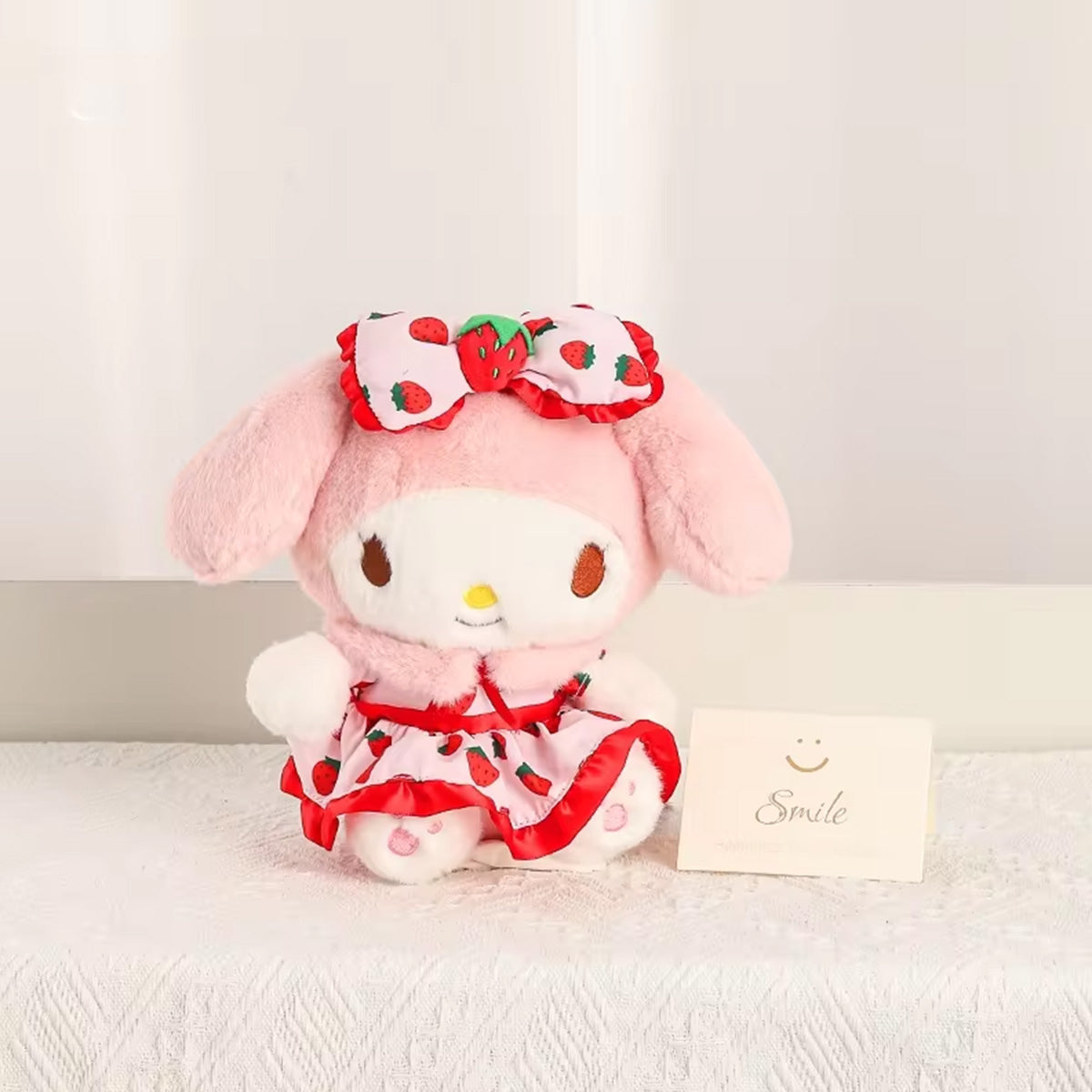 Sanrio Fresh Strawberry Series Plush Keychain 12cm with a pink bunny character dressed in a strawberry-themed outfit, adorned with a matching bow.