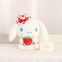 Sanrio Fresh Strawberry Series Plush Keychain 12cm showcasing a white bunny character with blue eyes, wearing a strawberry-patterned hat and holding a plush strawberry.