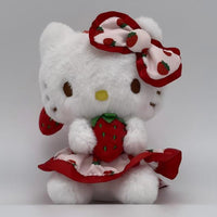 Sanrio Fresh Strawberry Series Plush Keychain 12cm with a white cat character holding a plush strawberry, dressed in a strawberry-patterned outfit with a matching bow.