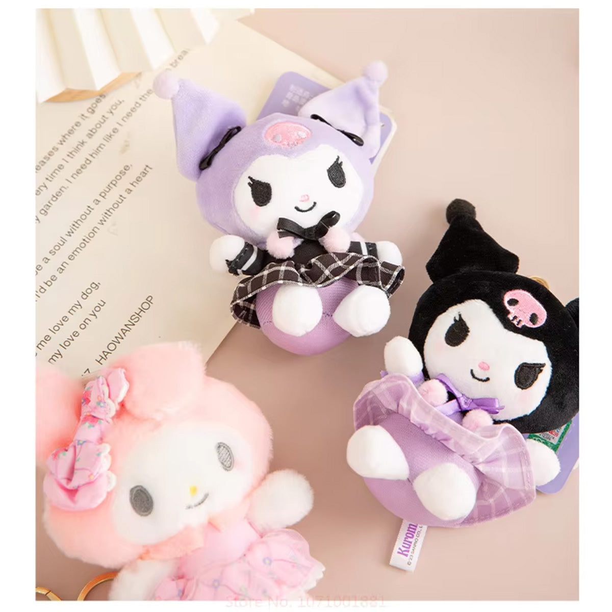 Sanrio Sakura Series Plush Keychain 10cm featuring Kuromi and My Melody in stylish outfits. A soft and collectible plush keychain set for fans.