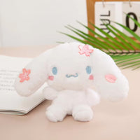 Sanrio Sakura Series Plush Keychain 10cm showcasing a white bunny character with embroidered cherry blossoms. A cute collectible plush keychain.