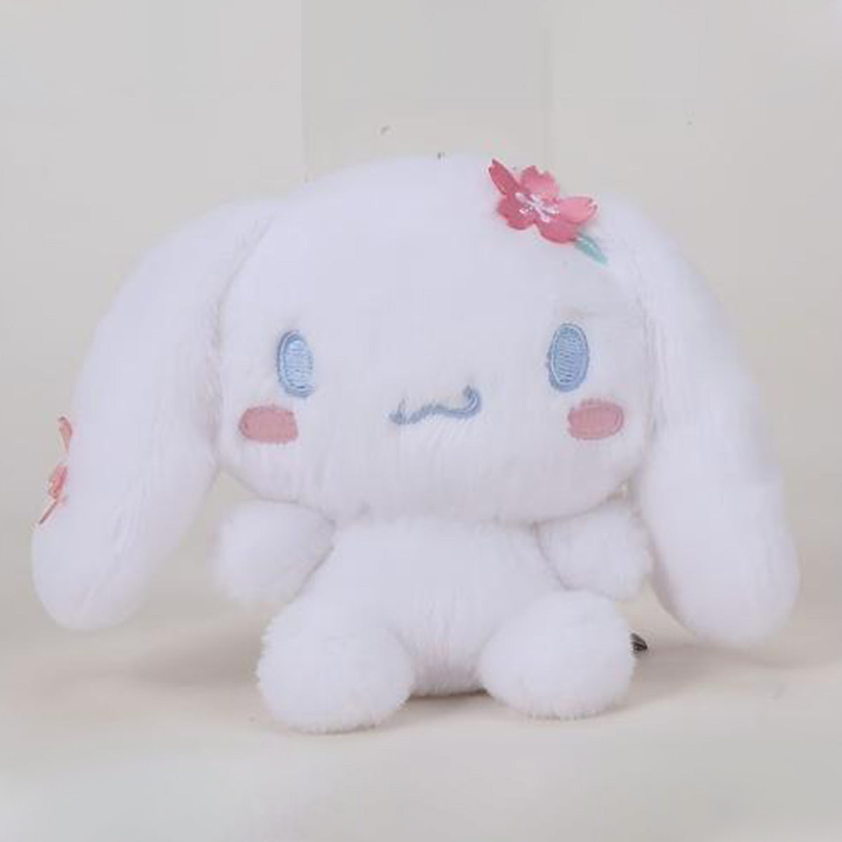 Sanrio Sakura Series Plush Keychain 10cm featuring a white bunny with cherry blossom embroidery. A soft and cute plush keychain for bags or keys.