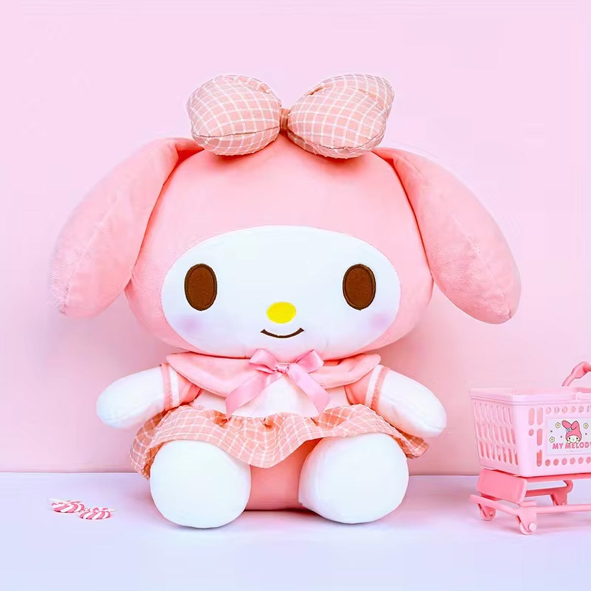 Sanrio Uniform Series My Melody Plush Toy 30cm in a pink checkered dress with a matching bow. Soft and huggable, perfect for collectors and fans.